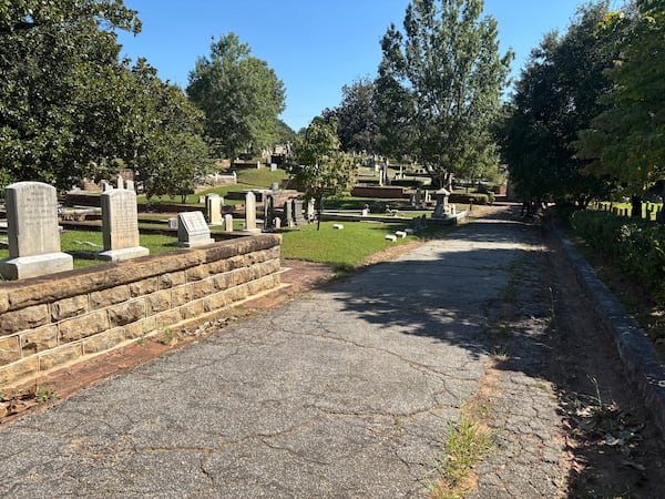 The columbarium will be built on this plot of land and unused road in the southeast area of the cemetery, officials said. (David Aaro/AJC)