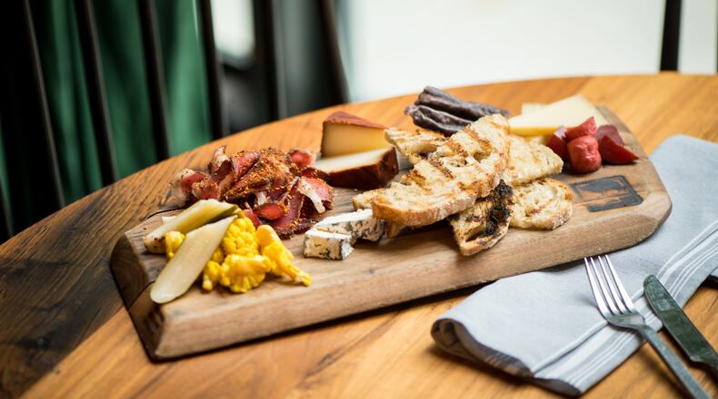 Biltong Bar Buckhead Biltong and Cheese plate with traditional, droewors, out of the ashes, griffin, alisios, house pickles, apricot chutney and grilled sourdough. Photo credit -Mia Yakel.