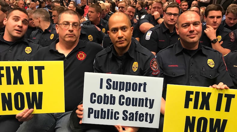 Cobb public safety employees urged the BOC to increase pay and benefits (Meris Lutz/AJC)