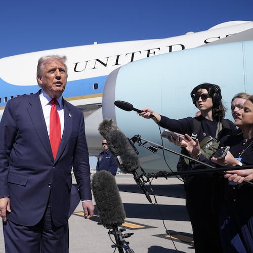President Donald Trump speaks to the media after arriving at Palm Beach International Airport, Friday, Oct. 31, 2025, in West Palm Beach, Fla. (AP Photo/Manuel Balce Ceneta)