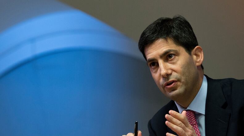 FILE - Kevin Warsh speaks to the media about his report on transparency at the Bank of England, in London, Dec., 11, 2014. (AP Photo/Alastair Grant, Pool, File)