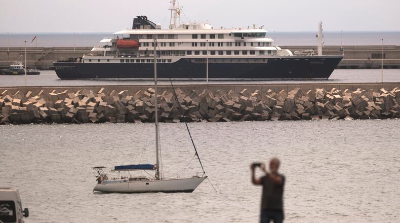 The hantavirus-stricken cruise ship MV Hondius is seen at anchor at the port of Granadilla in Tenerife, Canary Islands, Spain, Monday, May 11, 2026. (AP Photo/Arturo Rodriguez)