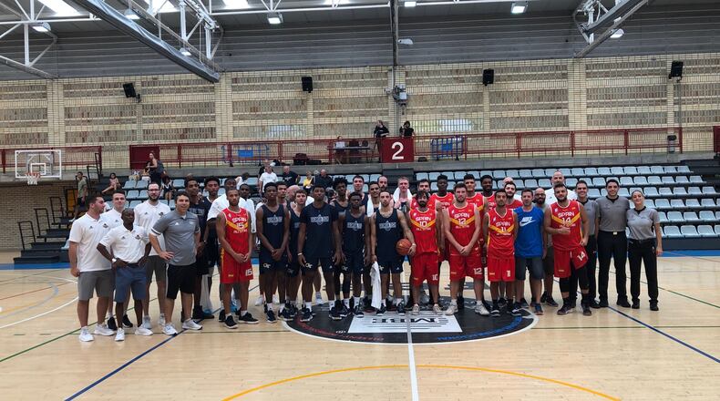 A group photo of the Georgia Tech men's basketball team with the team of Spanish professionals selected to play the Yellow Jackets August 10, 2019, in Barcelona, Spain. (Photo courtesy Mike Stamus, Georgia Tech Athletics)