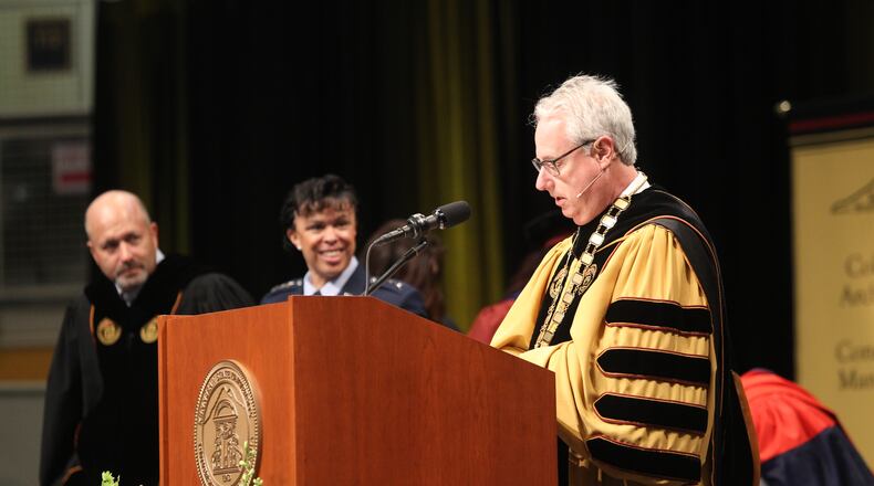 May 10, 2017, Atlanta, Georgia - Students along with their family and friends from Kennesaw State University in the College of Humanities and Social Sciences attend their Commencement ceremony to graduate from the university in Kennesaw, Georgia, on May 10, 2017. President Sam Olens addresses the crowd and students one last time before releasing them. (HENRY TAYLOR / HENRY.TAYLOR@AJC.COM)