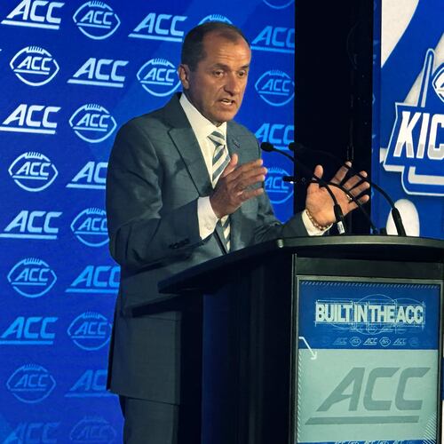ACC commissioner Jim Phillips speaks during ACC Kickoff preseason football media days, Wednesday, July 15, 2026 in Charlotte, N.C. (AP Photo/Aaron Beard)
