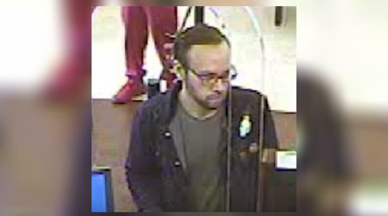Atlanta Police are searching for a man who slipped a Chase Bank teller a note demanding $200.