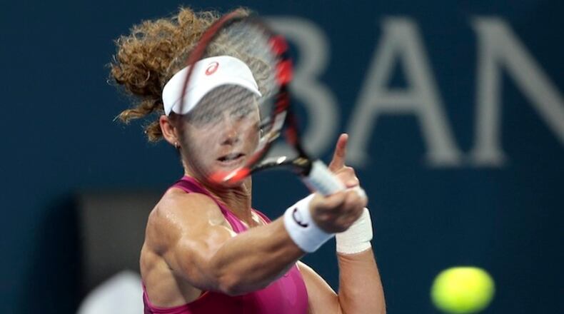 Sam Stosur of Australia plays a shot in her first round match against Jana Cepelova of Slovakia during the Brisbane International tennis tournament held in Brisbane, Australia, Monday, Jan. 4, 2016. (AP Photo/Tertius Pickard)