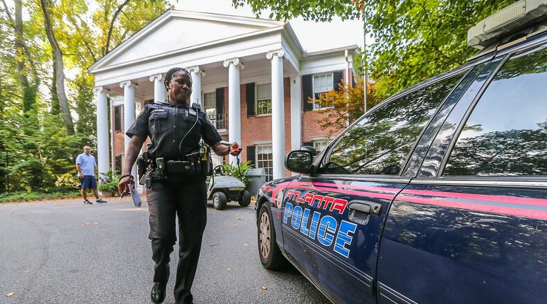 Atlanta police investigate a burglary at Pace Academy on Thurs., Aug. 6, 2015. JOHN SPINK/JSPINK@AJC.COM
