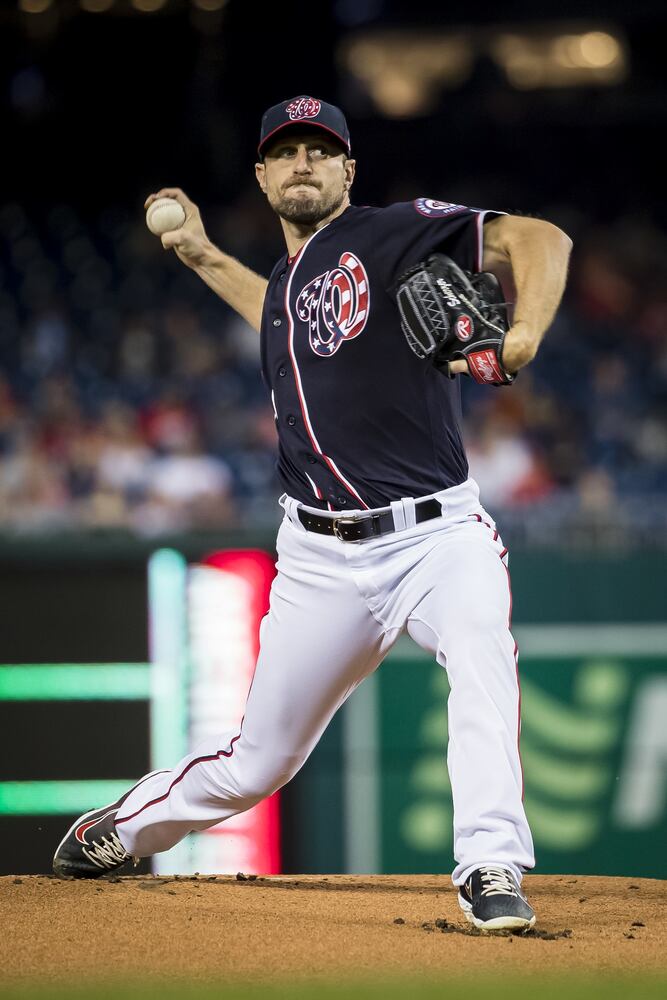Photos: Markakis leads Braves against Nationals