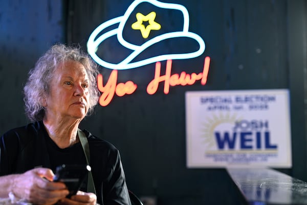 Roz Parneix, a supporter of Democratic candidate Josh Weil, watches for results during the special election for U.S. House District 6 before being called in favor of Republican candidate Randy Fine, Tuesday, April 1, 2025 in Ormond Beach, Fla. (AP Photo/Phelan M. Ebenhack)