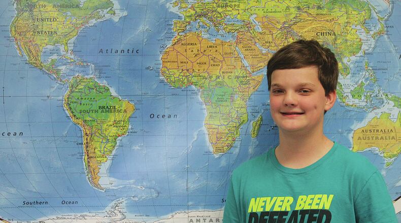 Luke Mabry of Freedom Middle School, Woodward Middle School eighth-grader Alex Bates and Woodward Academy North sixth-grader Eesh Trivedi and will compete March 31 at the Georgia State Bee, the second level of the national competition for the National Geographic Bee.