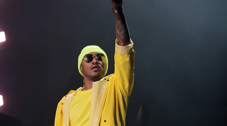 Atlanta rapper Future exhorts the crowd to show number one during his Lakewood Amphitheater concert on Friday, May 5, 2017. (Akili-Casundria Ramsess/Eye of Ramsess Media)