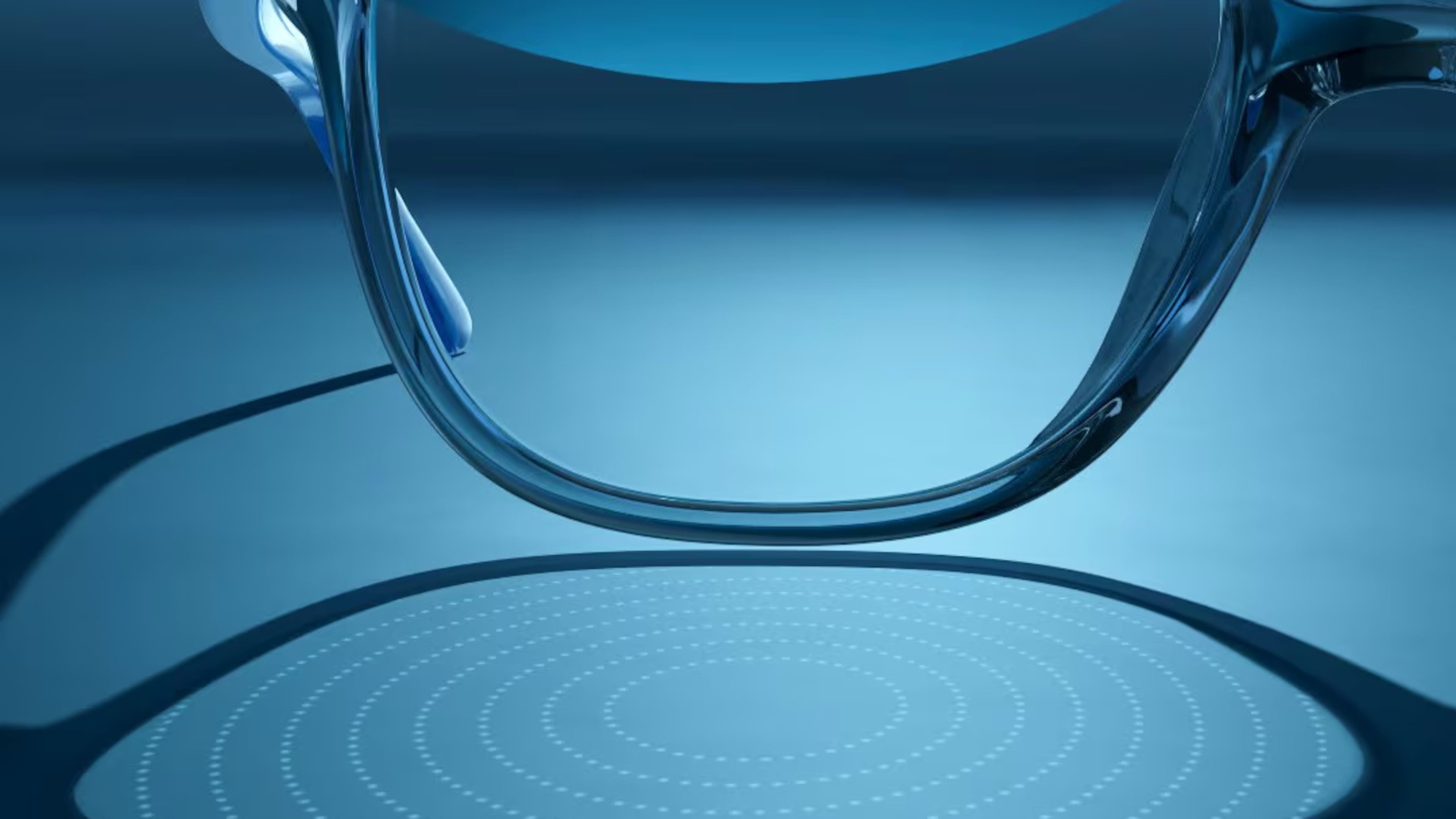 In this photo provided by EssilorLuxottica in October 2025, refractions caused by lenslets embedded in the company's Stellest eyeglass lens are projected onto a table. (Luxottica via AP)