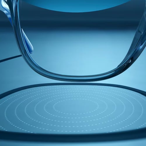 In this photo provided by EssilorLuxottica in October 2025, refractions caused by lenslets embedded in the company's Stellest eyeglass lens are projected onto a table. (Luxottica via AP)