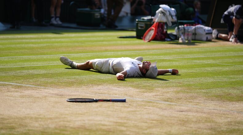Arthur Fery of Britain reacts to winning against Flavio Cobolli of Italy in their quarter-final men's singles match at the Wimbledon Tennis Championships in London, Wednesday, July 8, 2026. (AP Photo/Maja Smiejkowska)