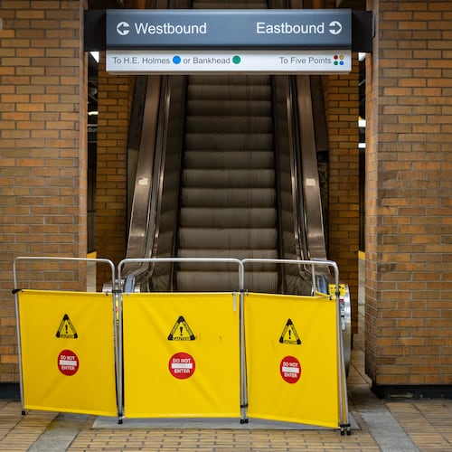 An escalator inside the Vine City MARTA station was blocked off Tuesday after at least 11 people were injured when a "stampede" led to an escalator malfunction following the Beyoncé concert. (Ben Hendren for the AJC)