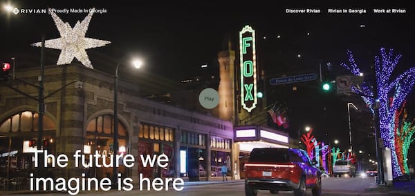 Electric vehicle manufacturer Rivian has launched an online campaign to illustrate its commitment to Georgia, even though it recently paused its construction of a $5 billion factory about an hour east of Atlanta. A scene from the campaign shows one of the company's SUVs traveling past Atlanta's Fox Theater.
