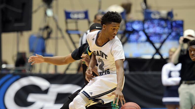 Kobi Simmons (2) handles the ball for the St. Francis Knights in this 2016 game in Macon against the Greenforest Christian Eagles.