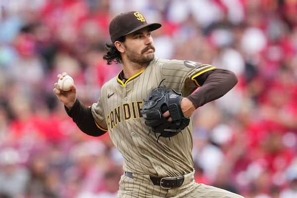 San Diego Padres pitcher Dylan Cease throws during the second inning of a baseball game against the Cincinnati Reds, Friday, June 27, 2025, in Cincinnati. (AP Photo/Jeff Dean)