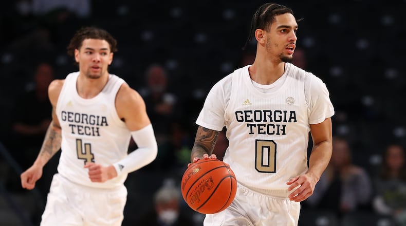 012322 Atlanta: Georgia Tech seniors Jordan Usher (left) and Michael Devoe (right) work against Clayton State in a NCAA college basketball game on Sunday, Jan. 23, 2022, in Atlanta. “Curtis Compton / Curtis.Compton@ajc.com”`