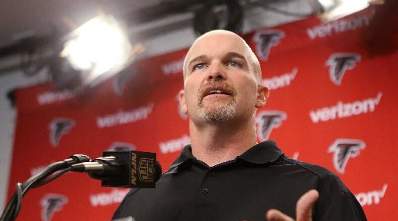 The defense made a big leap under first-year head coach Dan Quinn. (Curtis Compton/compton@ajc.com)