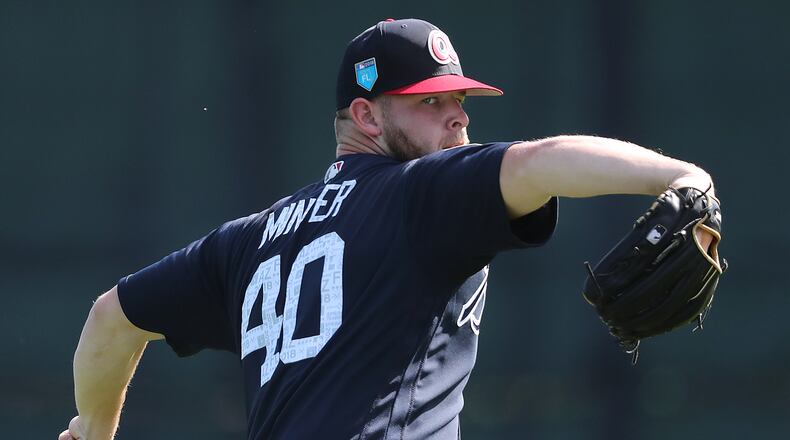 Feb 15, 2018 Lake Buena Vista: Braves pitcher A.J. Minter loosens up his arm on Thursday, Feb 15, 2018, at the ESPN Wide World of Sports Complex in Lake Buena Vista.     Curtis Compton/ccompton@ajc.com