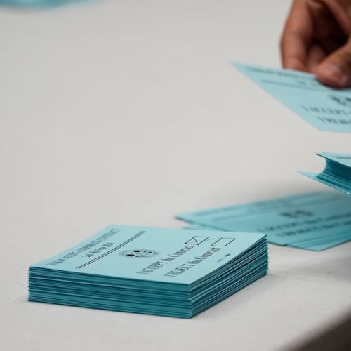 FILE - A volunteer sorts votes on a new contract offer from Boeing, Nov. 4, 2024, at the IAM District 751 Union Hall in Seattle. (AP Photo/Lindsey Wasson, File)