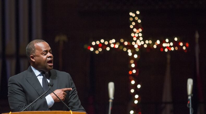 Former Atlanta Mayor Kasim Reed speaks during a December service in memory of late City Councilman Ivory Lee Young Jr. at Morehouse College. STEVE SCHAEFER / SPECIAL TO THE AJC