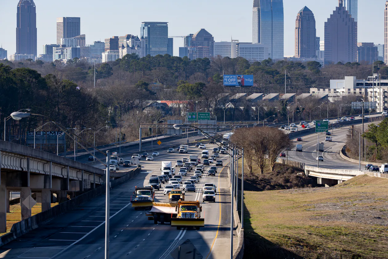 Metro Atlanta residents said in a recent survey that their top pressing concerns in the region are housing affordability and traffic. Zoning reform would help, the guest column authors write. (On I-85, from Jan. 26, 2026 / Ben Hendren for the AJC)
