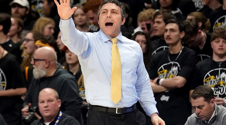 Georgia Tech head coach Josh Pastner calls out to his team as it faces Pittsburgh Tuesday, Feb. 21, 2023. (AP Photo/Matt Freed)