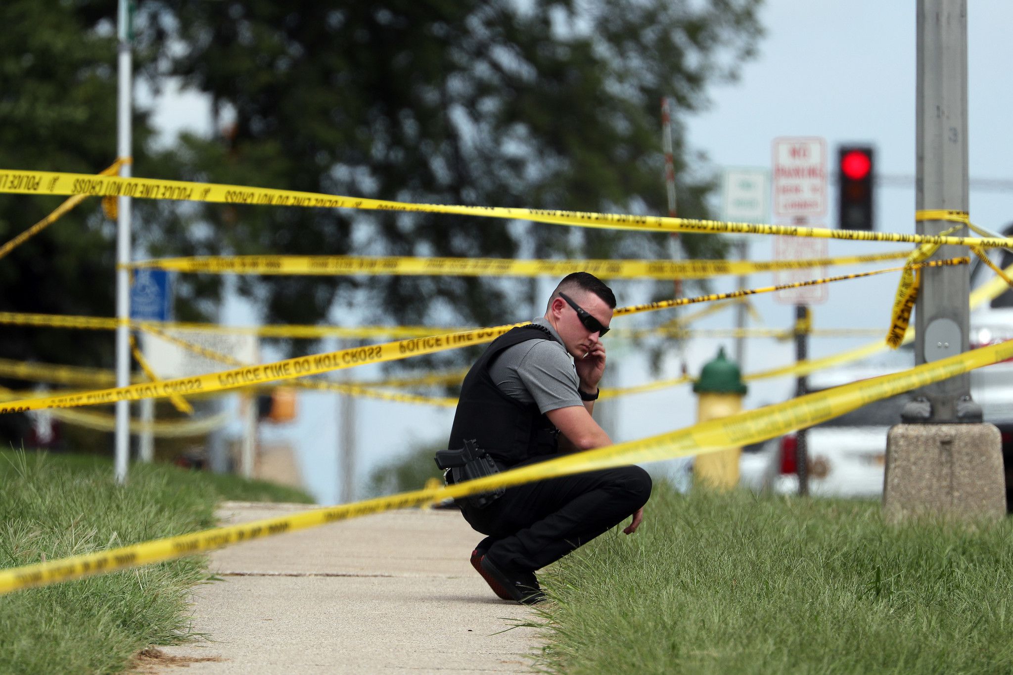 Ribbons of police tape mark a crime scene near the Kankakee County Courthouse in Kankakee, Ill., after a fatal shooting outside the building Thursday.