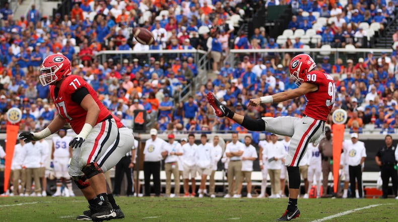 Georgia punter Jake Camarda (90) punts against Florida on Oct. 27, 2019, at TIAA Bank Field in Jacksonville, Fla.