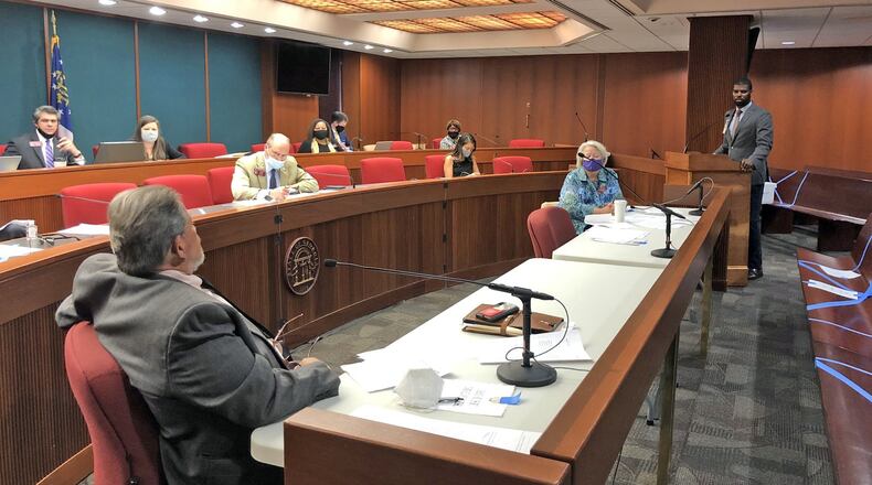 Chris Bruce of the American Civil Liberties Union of Georgia testifies to the House Governmental Affairs Committee on Wednesday, June 24, 2020. The committee amended Senate Bill 423 to prohibit election officials from sending absentee ballot request forms to voters, as Georgia Secretary of State Brad Raffensperger did before the state s June 9 primary. MARK NIESSE / MARK.NIESSE@AJC.COM