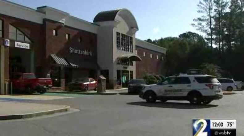 This Cherokee County car dealership was robbed at gunpoint Friday. (Credit: Channel 2 Action News)
