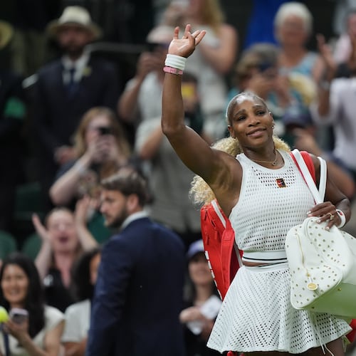Serena Williams of the United States greets the audience as she leaves after losing to Maya Joint of Australia in their first round women's singles match at the Wimbledon Tennis Championships in London, Tuesday, June 30, 2026. (AP Photo/Maja Smiejkowska)