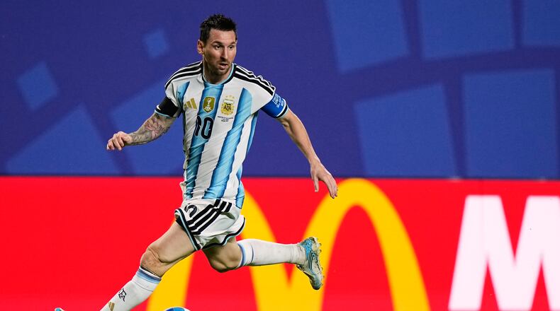 Argentina's Lionel Messi (10) dribbles the ball during the World Cup quarterfinal soccer match against Switzerland in Kansas City, Mo., Saturday, July 11, 2026. (AP Photo/Charlie Riedel)