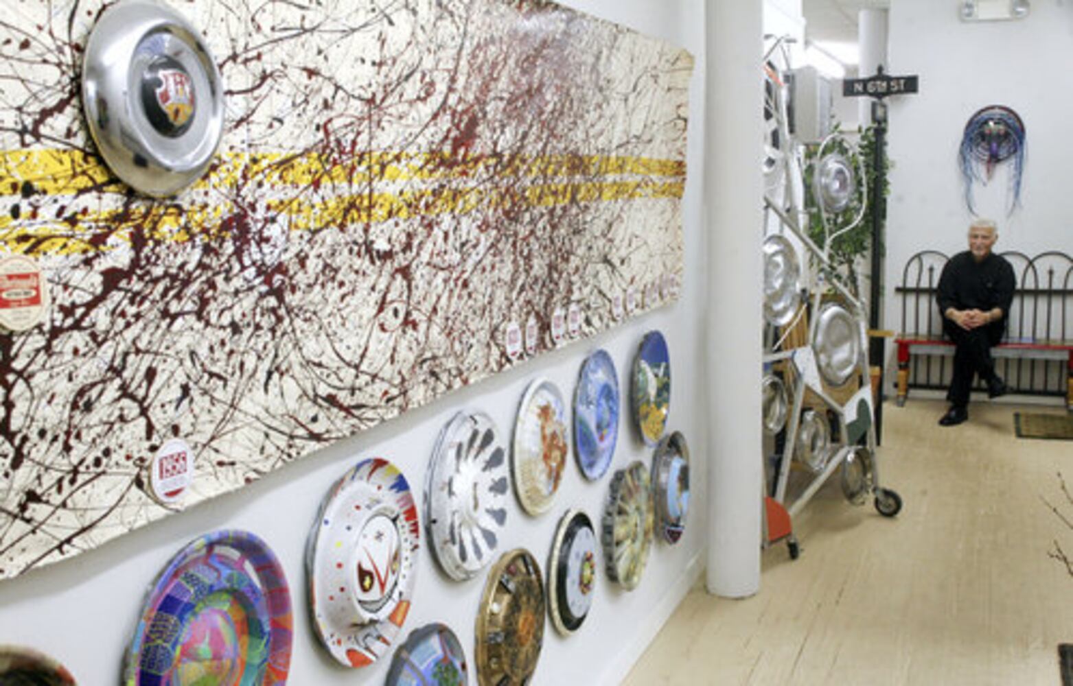 Hubcap art adds vroom to room