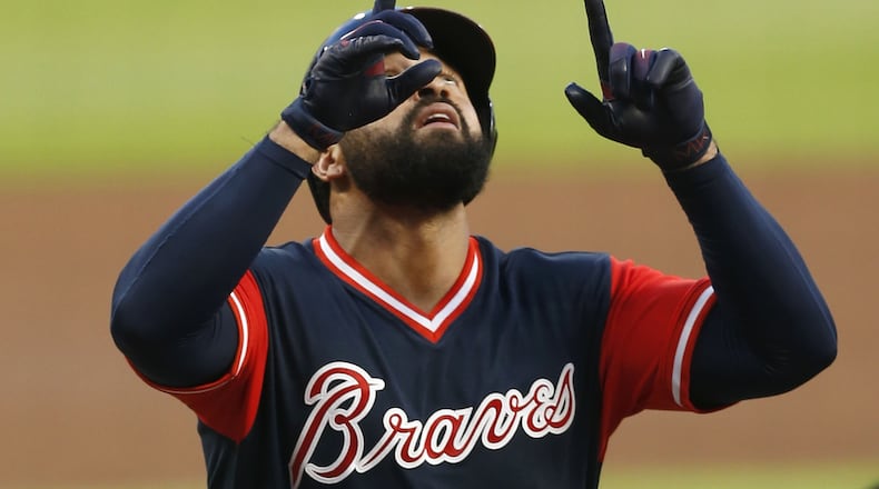 ATLANTA, GA - AUGUST 25: Left fielder Matt Kemp #27 of the Atlanta Braves gestures after hitting a home run in the first inning during the game against the Colorado Rockies at SunTrust Park on August 25, 2017 in Atlanta, Georgia. (Photo by Mike Zarrilli/Getty Images)