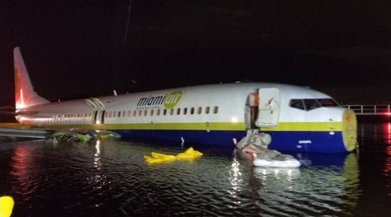The plane that skidded off the runway at the Jacksonville Naval Air Station landed in the St. Johns River.