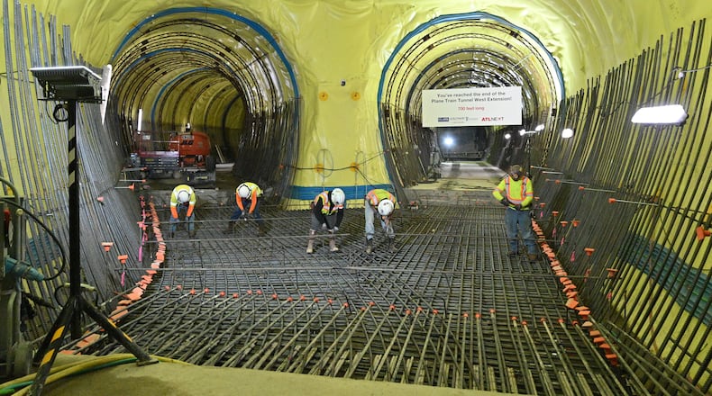 June 9, 2022 Atlanta - Crews work on a 700-foot-long tunnel under construction beneath Hartsfield-Jackson International on Thursday, June 9, 2022. Sixty feet below the world's busiest airport, crews from the Clark Construction-led joint venture of Clark/Atkinson/Technique have been excavating a 833-foot extension for the Plane Train tunnel.  (Hyosub Shin / Hyosub.Shin@ajc.com)
