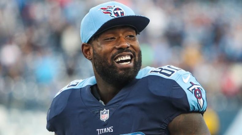 Tennessee Titans tight end Delanie Walker (82) smiles after a Titan's touchdown during an NFL football game against the Houston Texans, Sunday, Dec. 3, 2017, in Nashville, Tenn. (Austin Anthony/Daily News via AP)