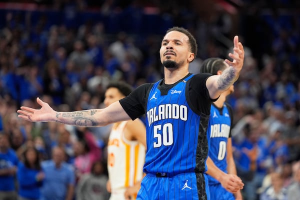 FILE - Orlando Magic guard Cole Anthony (50) waves his arms to the fans during the second half of an NBA play-in tournament basketball game against the Atlanta Hawks, April 15, 2025, in Orlando, Fla. (AP Photo/John Raoux, File)