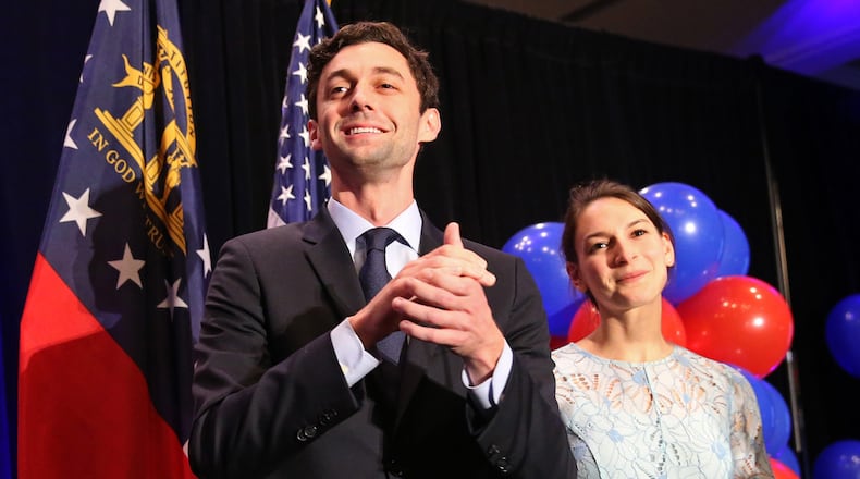 Sixth District congressional candidate Jon Ossoff with his fiancé Alisha Kramer on election night. AJC/Jason Getz