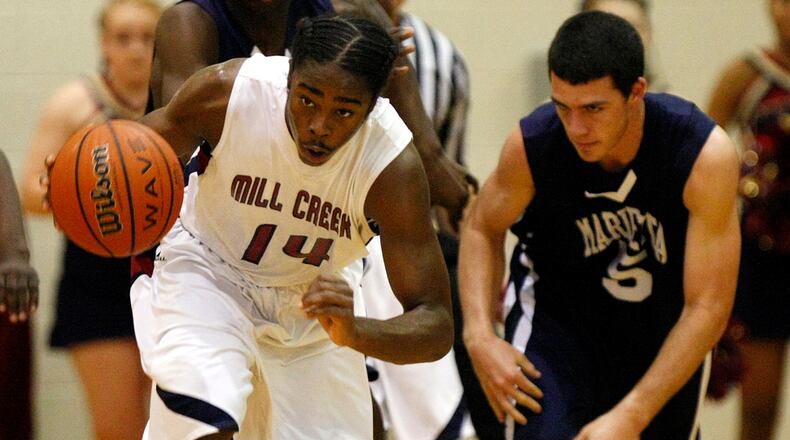 Braves shortstop Dansby Swanson (right) also played basketball at Marietta High School. Curtis Compton ccompton@ajc.com