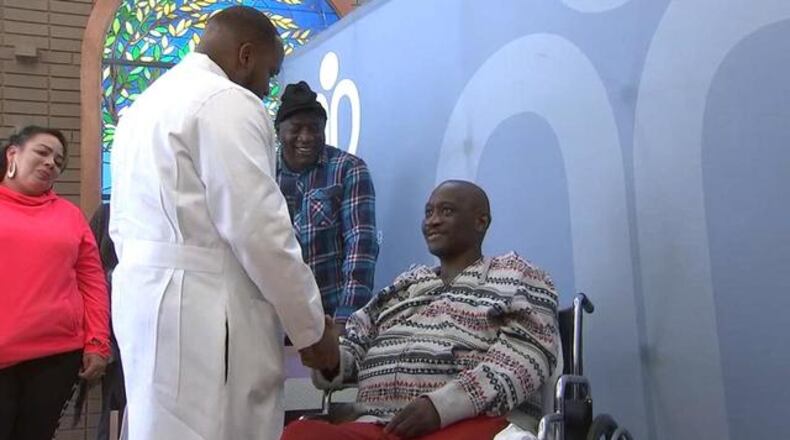 Will Hudson is congratulated by his doctor, Luttrell Toussaint. (Credit: Channel 2 Action News)