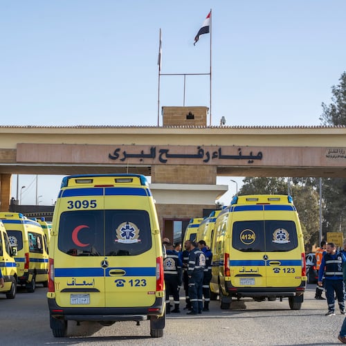 Ambulances line up to enter the Egyptian gate of the Rafah crossing on the way to the Gaza Strip, in Rafah, Egypt, Sunday, Feb. 1, 2026. (AP Photo/Mohamed Arafat)