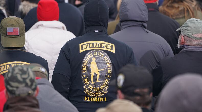 A member of the Oath Keepers looks on as supporters of Donald Trump attend a rally protesting the 2020 election results in Washington, DC., on January 6, 2021. (Bryan Smith/ZUMA Wire/TNS)