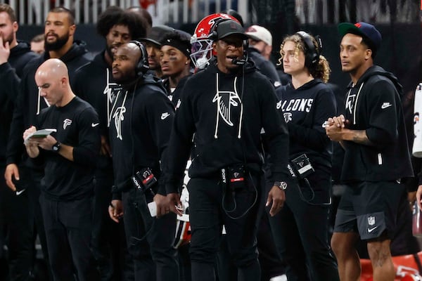 Falcons head coach Raheem Morris calls a play during the second half of Monday's win over the Rams.