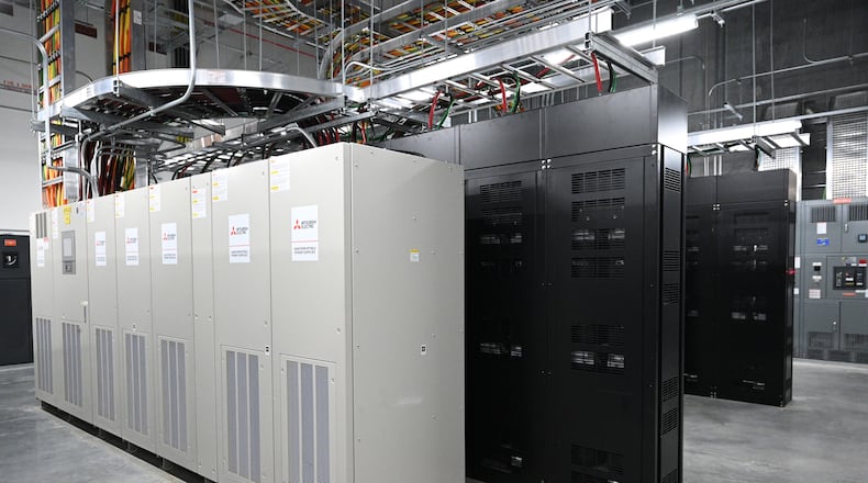 Power distribution units are shown during a tour of QTS’ Atlanta Data Center Campus on Wednesday, Aug. 31, 2022. Since 2023, a flurry of activity has made the Atlanta area’s data center market the hottest in the country, a trend that hasn’t slowed this year. (Hyosub Shin/AJC 2022)
