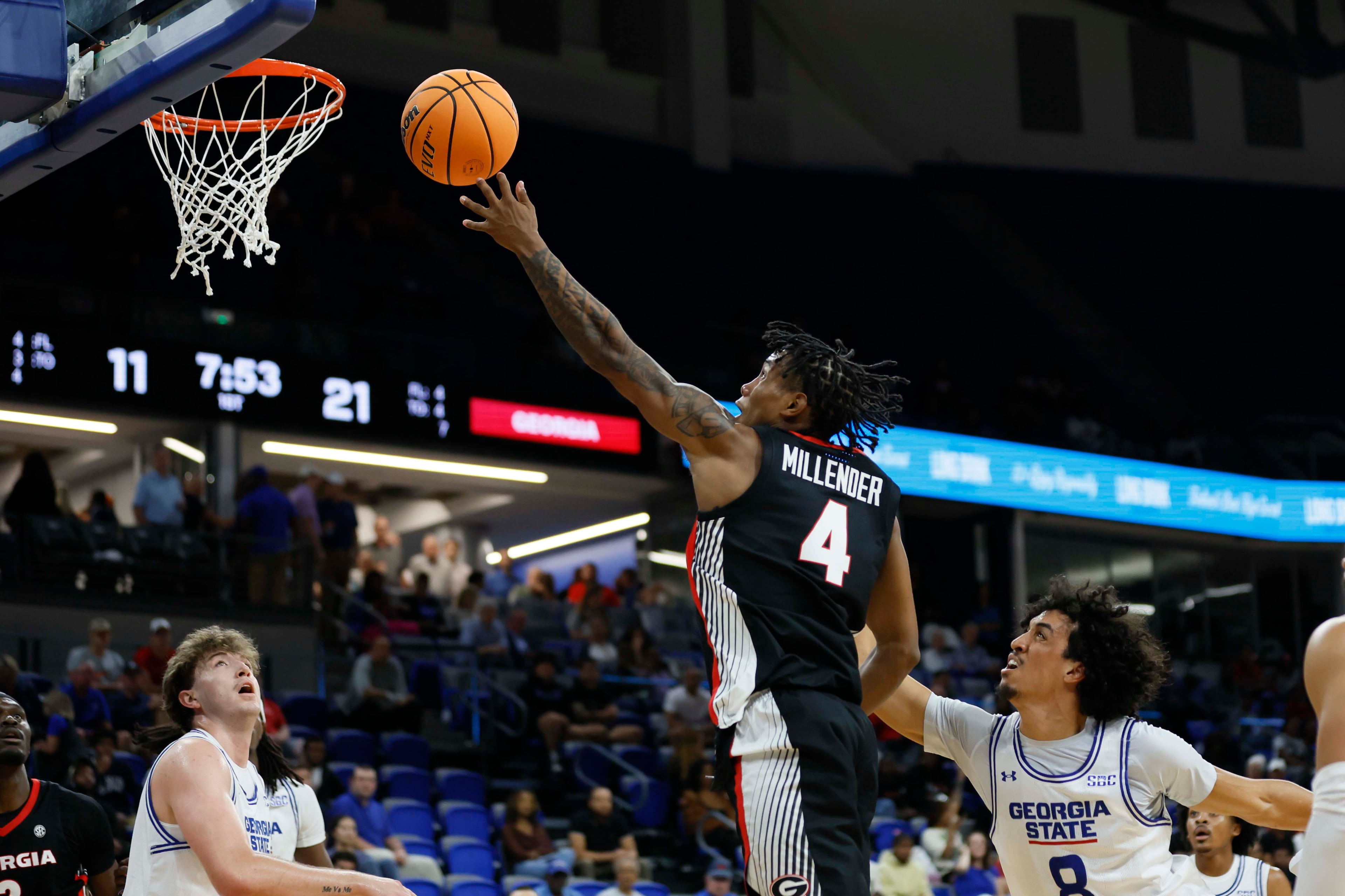 Georgia Bulldogs guard Marcus Millender (4) goes up for a basket against Georgia State Panthers forward Isaiah Sherrard (8) during the first half of an exhibition opener game at the Georgia State Convocation Center, Wednesday, October 15, 2025, in Atlanta.
(Miguel Martinez/ AJC)
